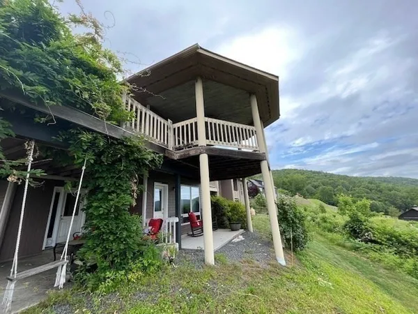 a view of a porch of the house
