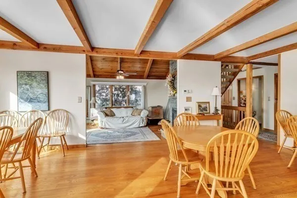 a dining room with lots of tables and chairs