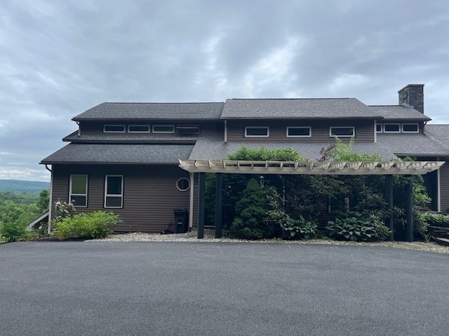 151 Smead Hill Road Greenfield, MA 01301 - Photo 21 of 24 front view of a house with a street