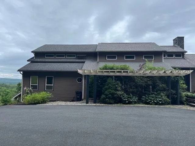 front view of a house with a street