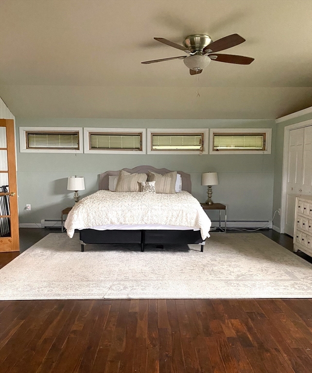 151 Smead Hill Road Greenfield, MA 01301 - Photo 5 of 13 a bedroom with a bed and a ceiling fan