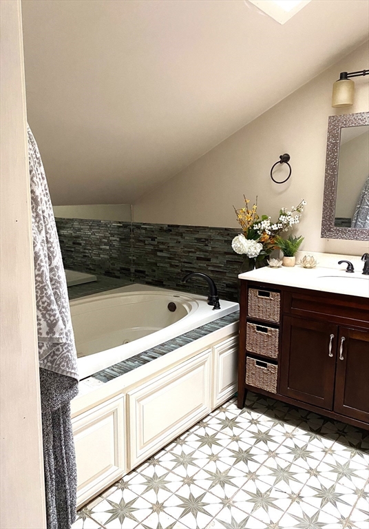 151 Smead Hill Road Greenfield, MA 01301 - Photo 6 of 13 a bathroom with a sink vanity and mirror