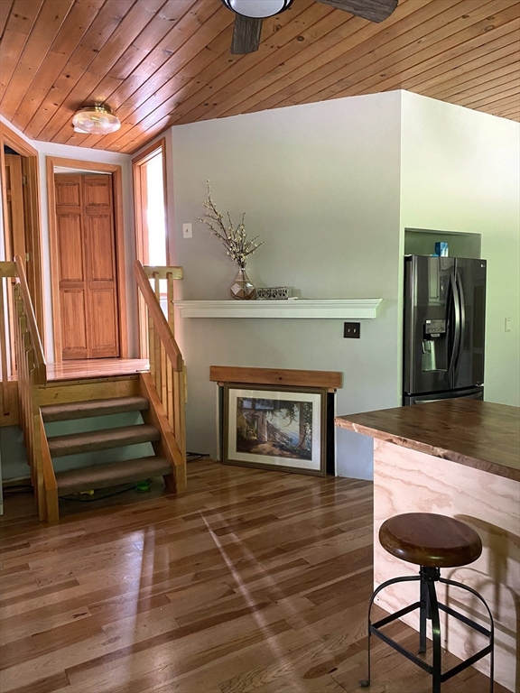 151 Smead Hill Road Greenfield, MA 01301 - Photo 7 of 24 a living room with furniture and a fireplace