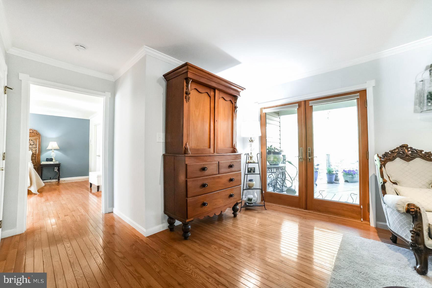 13425 Olivet Road Lusby, MD 20657 - Photo 24 of 59 a view of a bedroom with furniture and windows