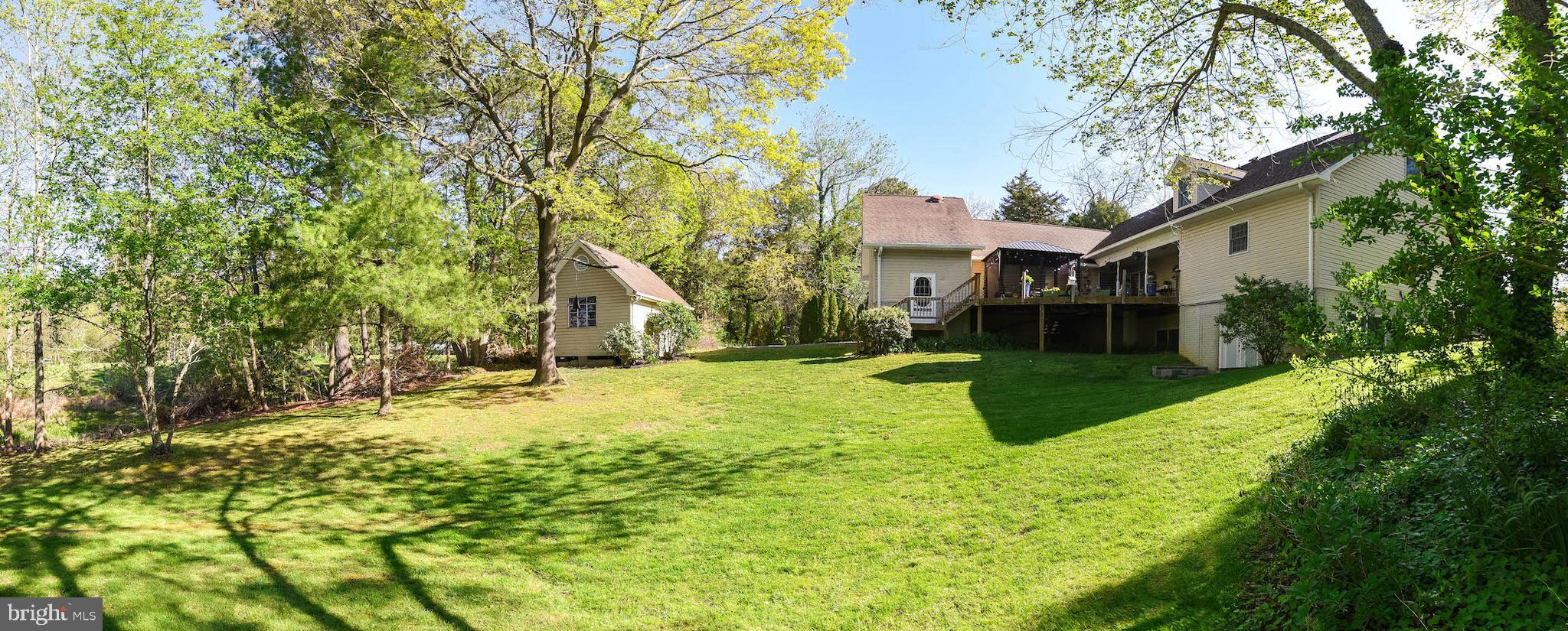 13425 Olivet Road Lusby, MD 20657 - Photo 5 of 59 a view of a house with a yard