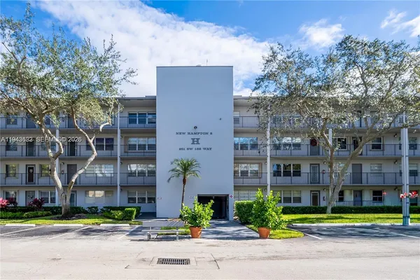 a front view of a building with street view