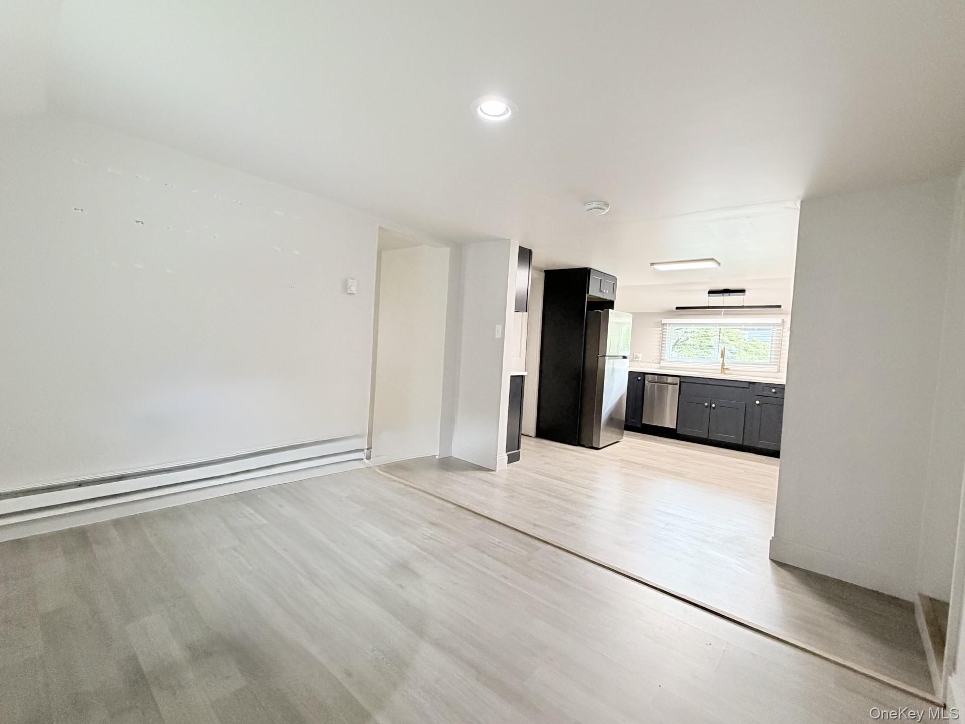 4 Lower Trinity Pass Road Pound Ridge, NY 10576 - Photo 15 of 29 a view of an empty room with a window
