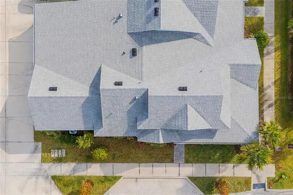 an aerial view of a house with garden