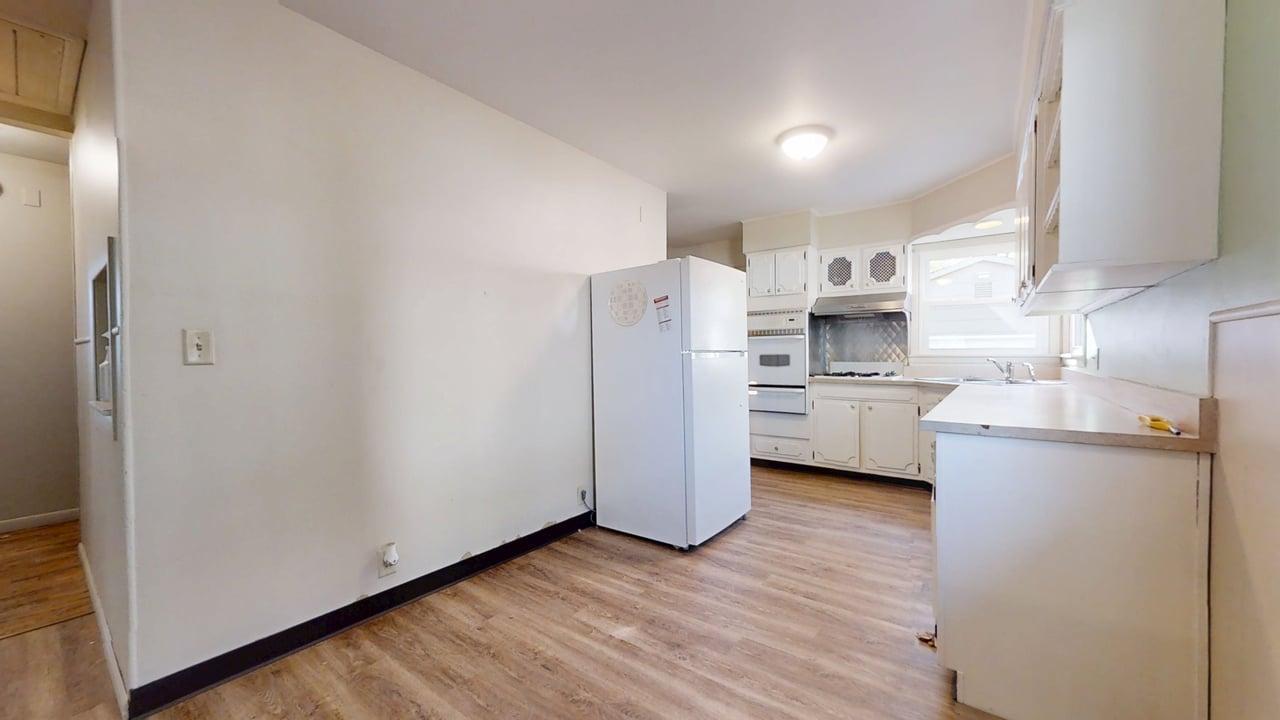 915 Morgan Street Normal, IL 61761 - Photo 12 of 43 a kitchen with a refrigerator a sink and dishwasher