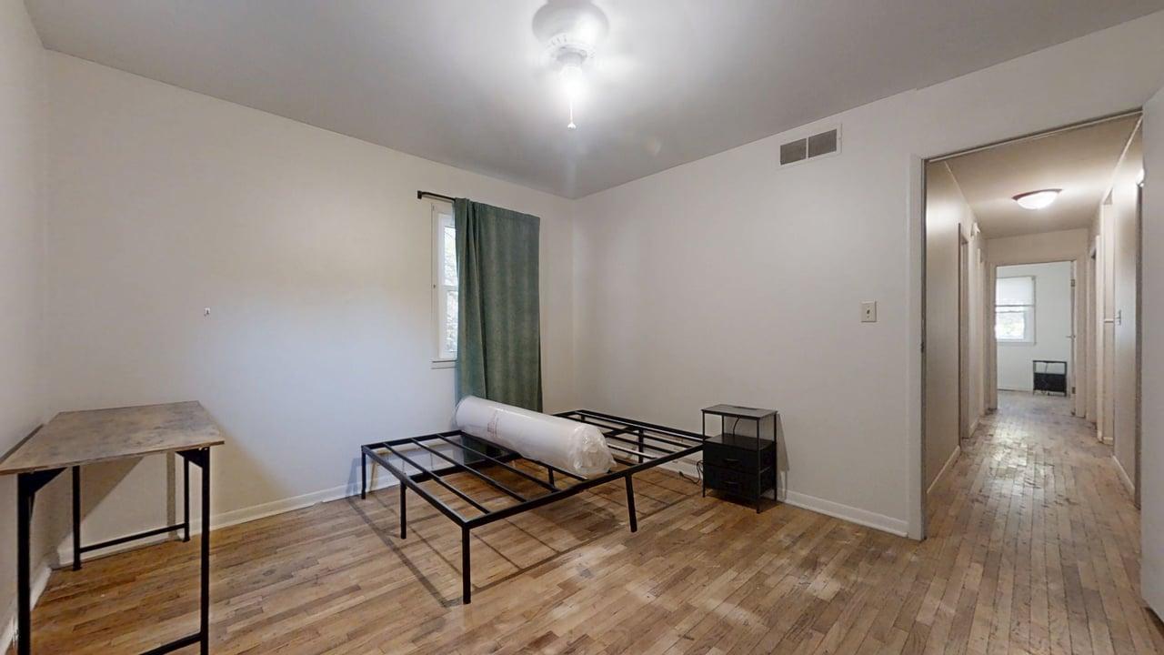 915 Morgan Street Normal, IL 61761 - Photo 22 of 43 a living room with furniture and wooden floor