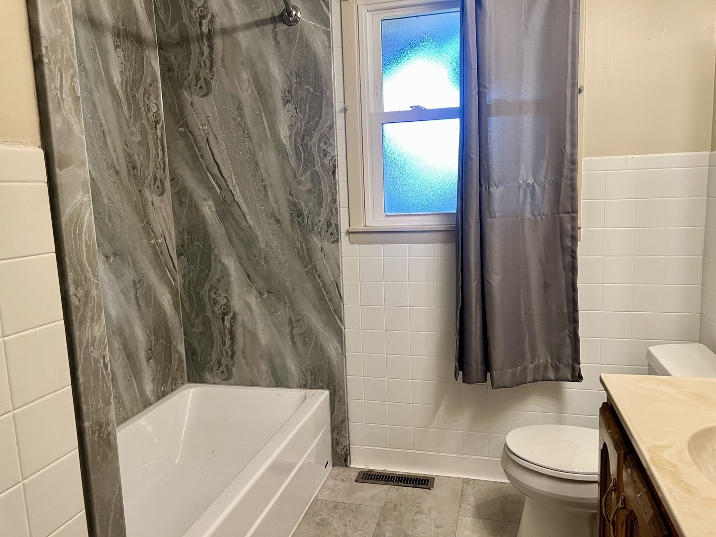 915 Morgan Street Normal, IL 61761 - Photo 26 of 43 a bathroom with a sink and a toilet