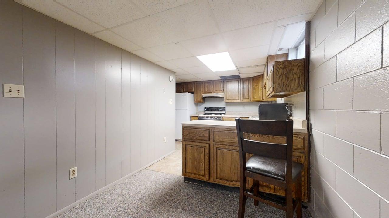 915 Morgan Street Normal, IL 61761 - Photo 31 of 43 a kitchen with cabinets and chairs