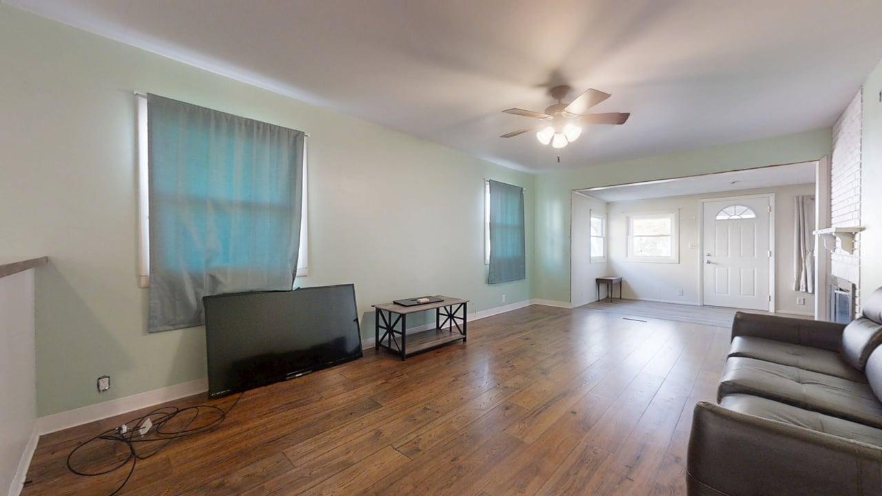 915 Morgan Street Normal, IL 61761 - Photo 9 of 43 a view of a livingroom with furniture and wooden floor