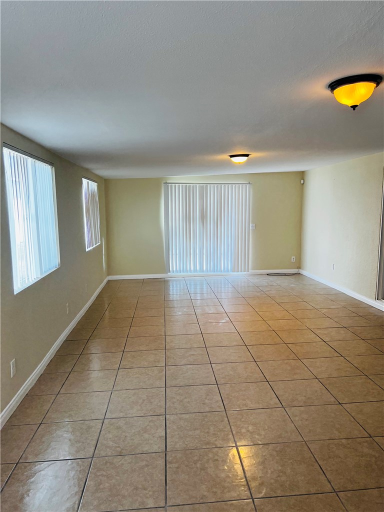12771 Ponderosa Ranch Road Victorville, CA 92392 - Photo 20 of 23 a view of an empty room and window