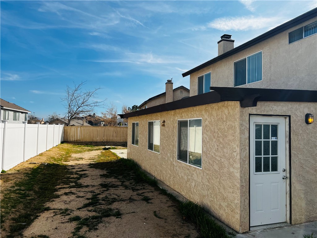 12771 Ponderosa Ranch Road Victorville, CA 92392 - Photo 23 of 23 a view of a house with a snow