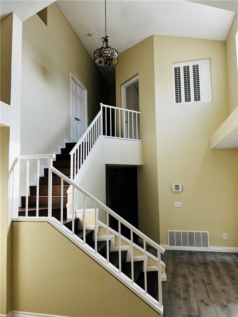 12771 Ponderosa Ranch Road Victorville, CA 92392 - Photo 10 of 23 a view of living room with stairs