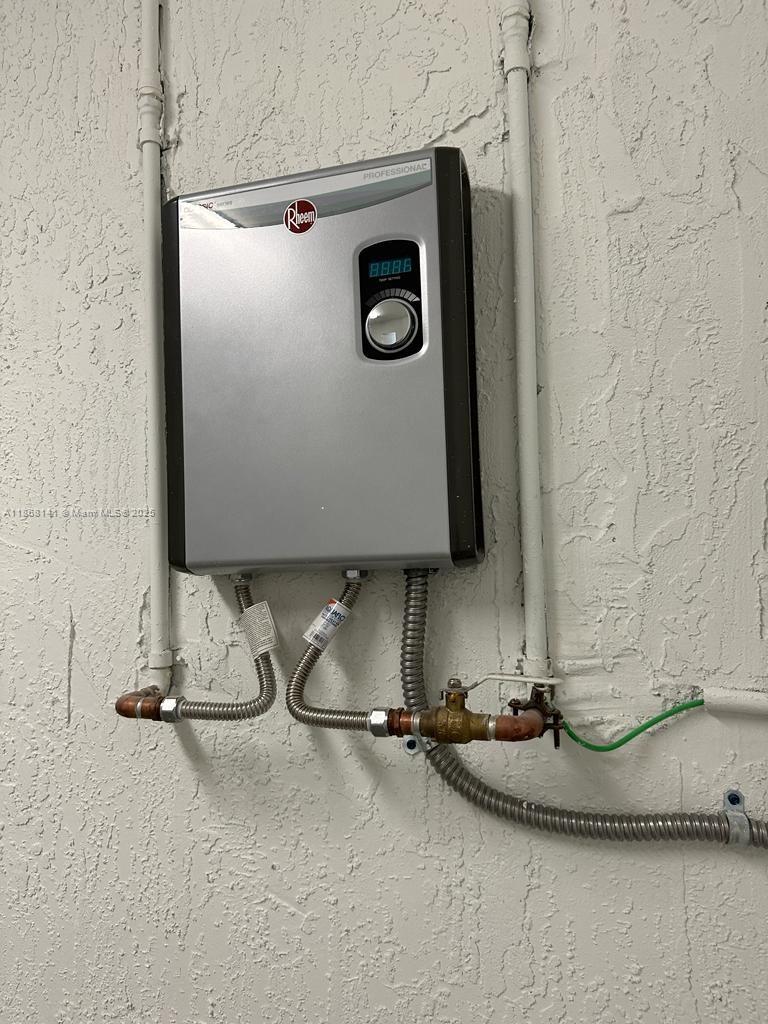 11926 Southwest 245 Terrace Homestead, FL 33032 - Photo 28 of 43 a bathroom with a granite countertop sink and a mirror