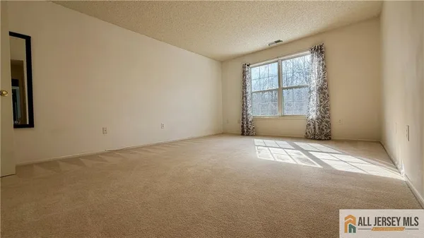 an empty room with closet