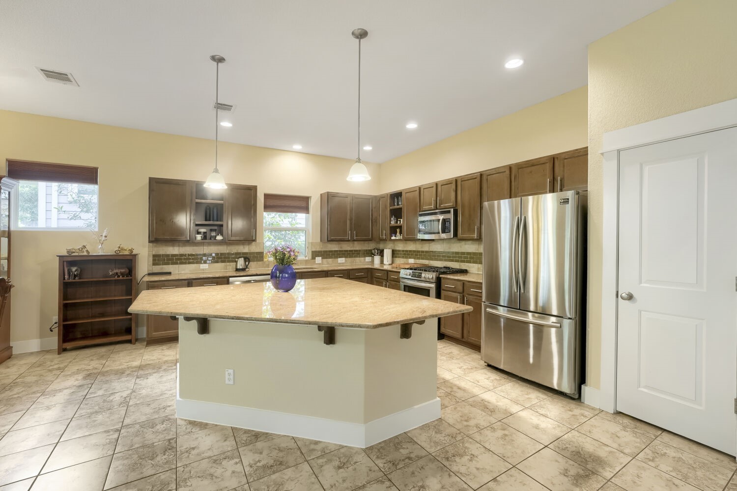 805 Waterfall Way Austin, TX 78753 - Photo 4 of 29 Huge open kitchen with large center island perfect for entertaining