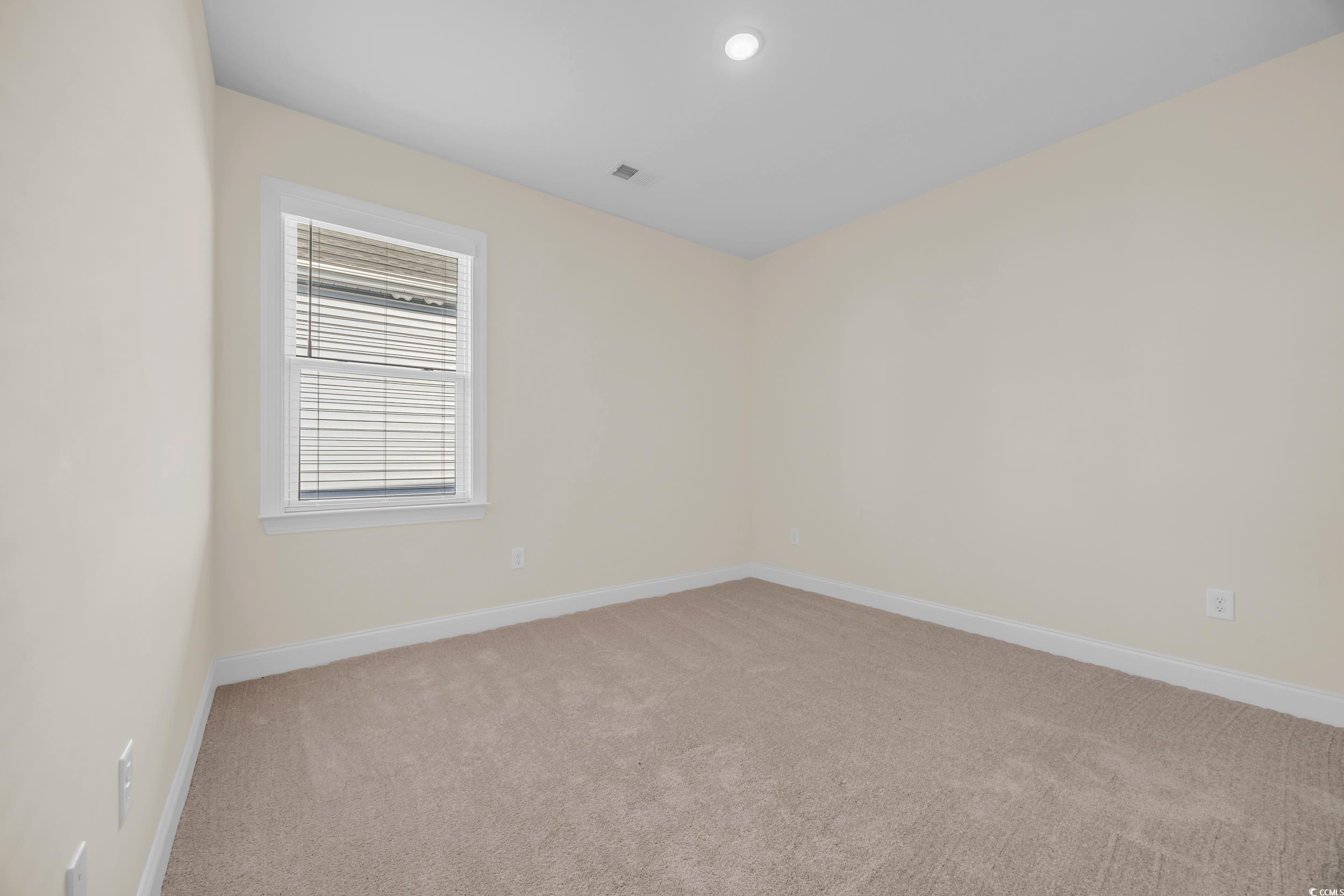 546 Beckham Court Murrells Inlet, SC 29576 - Photo 12 of 34 View of carpeted empty room