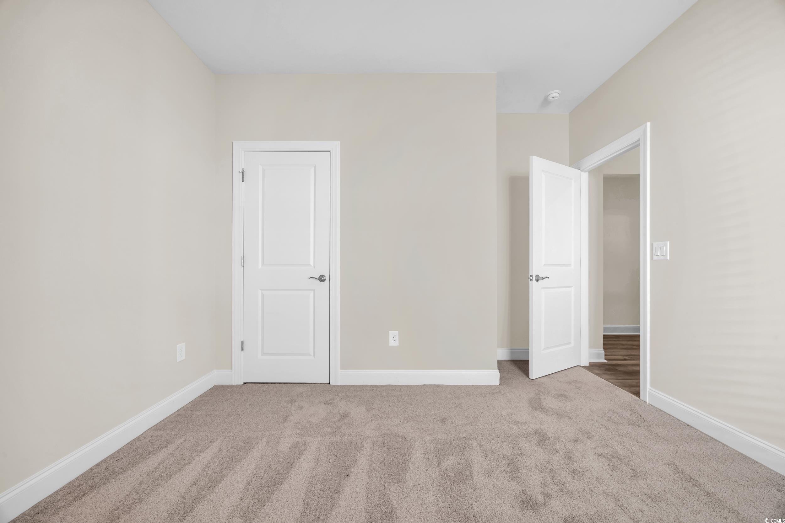 546 Beckham Court Murrells Inlet, SC 29576 - Photo 13 of 34 Unfurnished bedroom with carpet flooring
