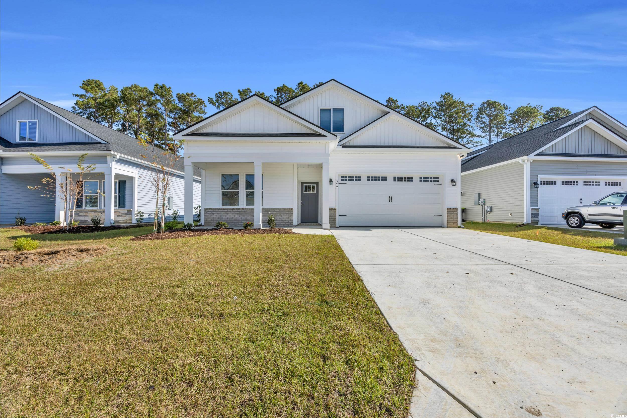 546 Beckham Court Murrells Inlet, SC 29576 - Photo 2 of 34 View of front of house featuring a garage and a fr