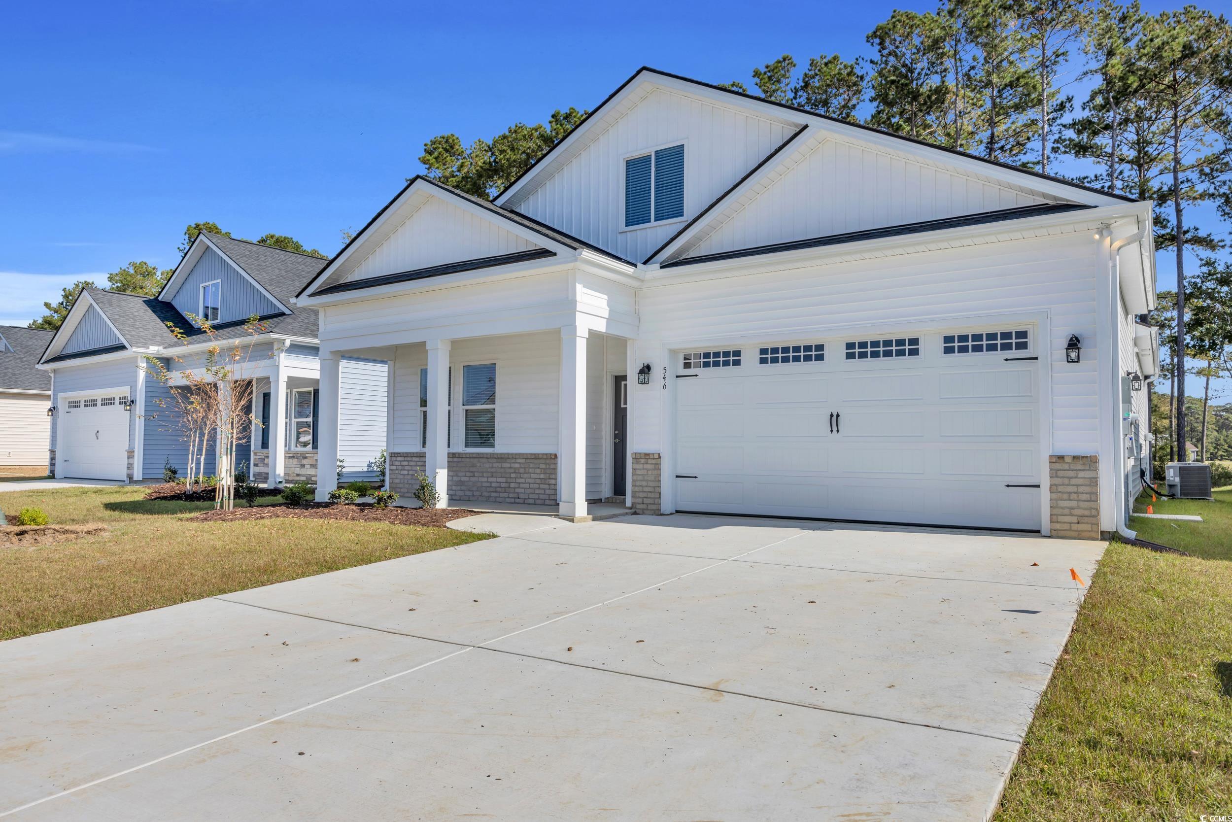 546 Beckham Court Murrells Inlet, SC 29576 - Photo 4 of 34 View of front of home featuring a garage, a front