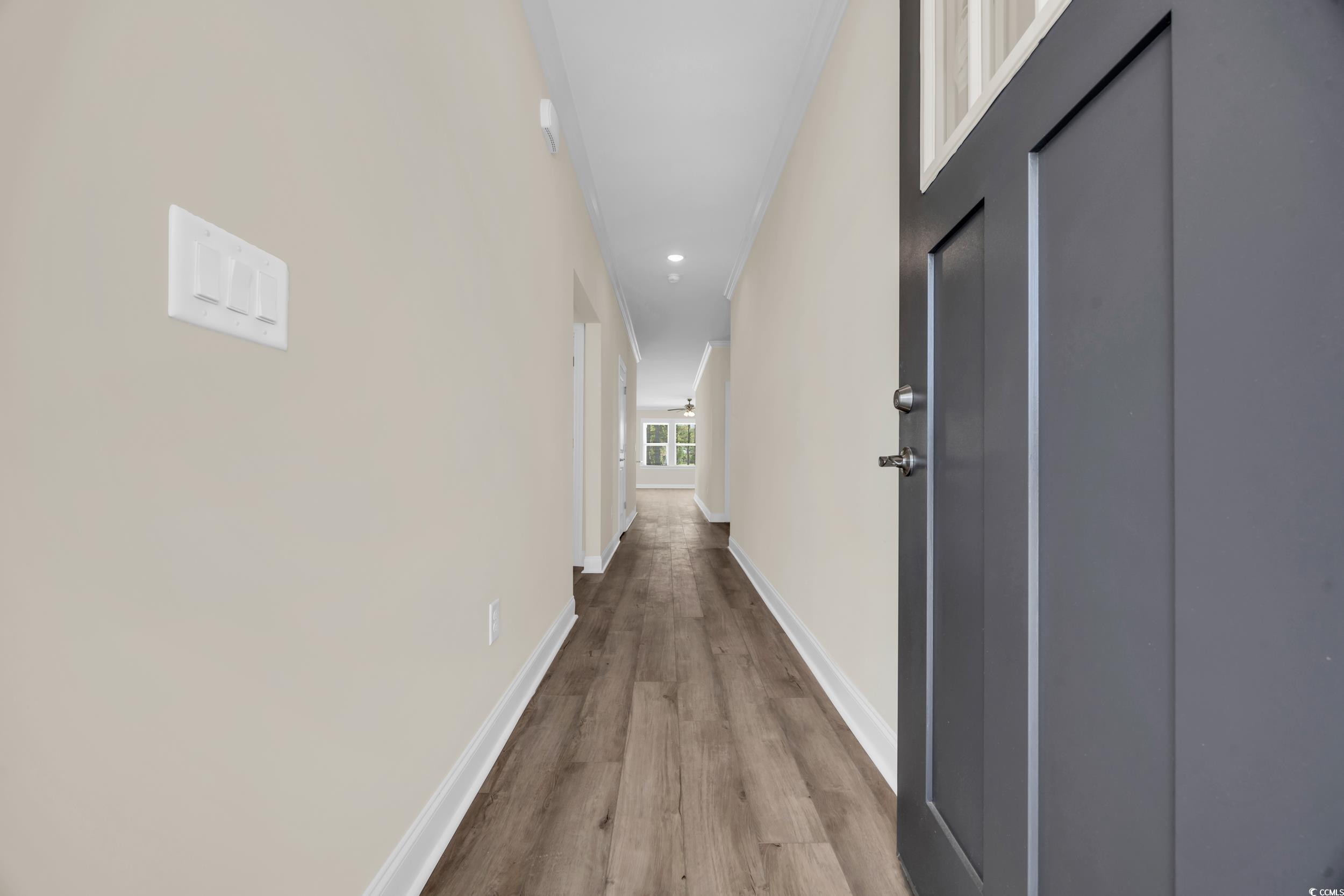 546 Beckham Court Murrells Inlet, SC 29576 - Photo 7 of 34 Corridor featuring light hardwood / wood-style flo