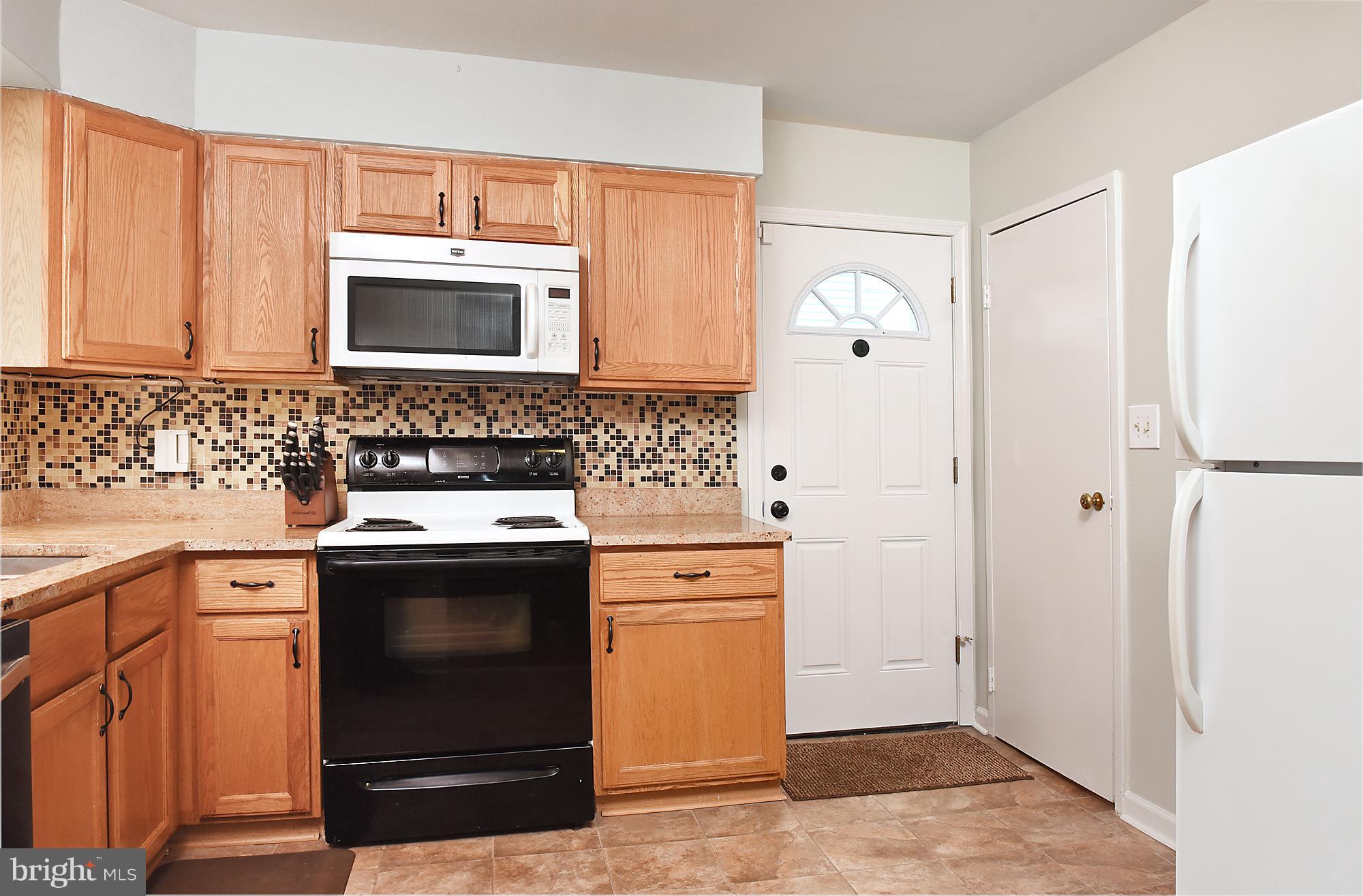 1013 Crosby Road Catonsville, MD 21228 - Photo 10 of 30 Updated kitchen with easy access to outside.