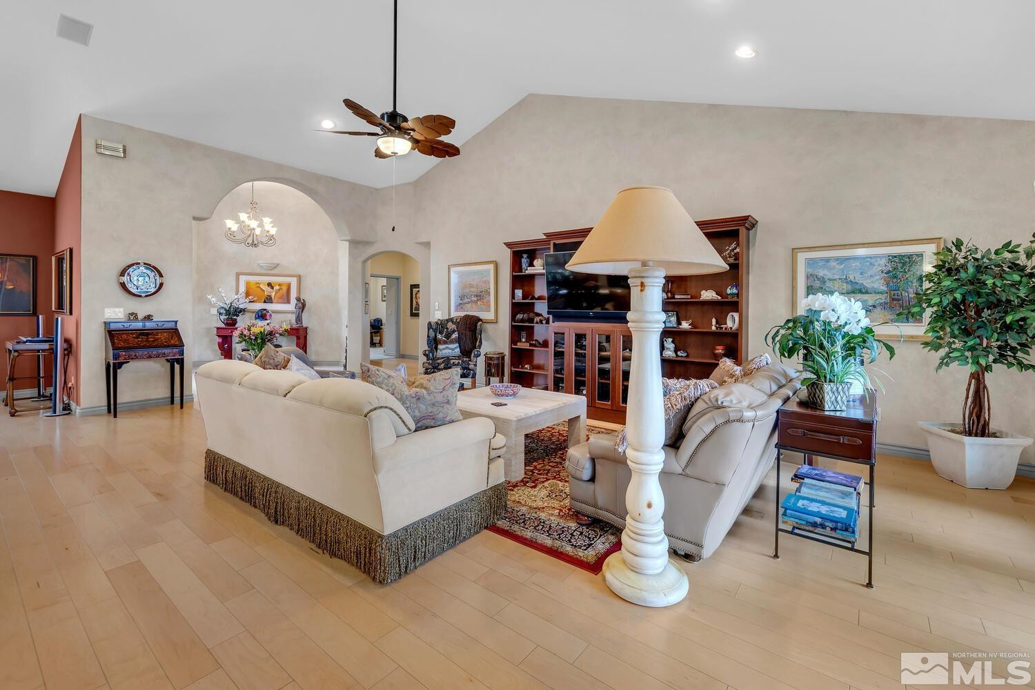 1465 Wolf Run Road Reno, NV 89511 - Photo 9 of 40 a living room with furniture and wooden floor