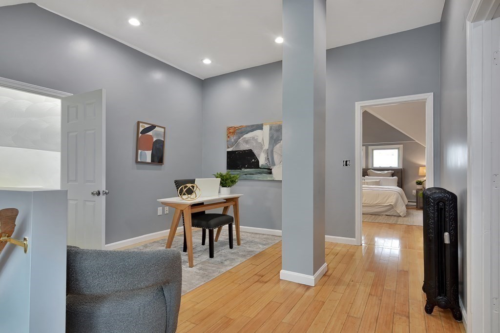 47 Moore Street Lowell, MA 01852 - Photo 25 of 36 a workspace with furniture and wooden floor