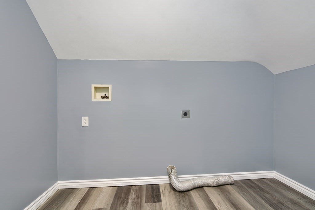 47 Moore Street Lowell, MA 01852 - Photo 29 of 36 a view of room with racks on the wall