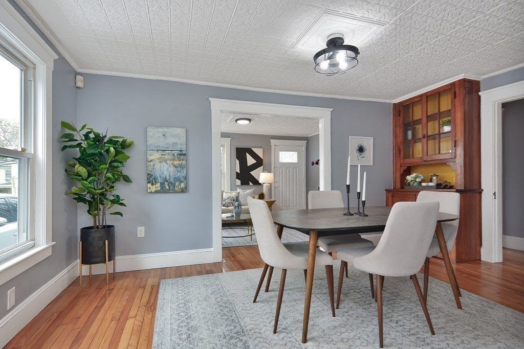 47 Moore Street Lowell, MA 01852 - Photo 7 of 36 a view of a dining room with furniture and window