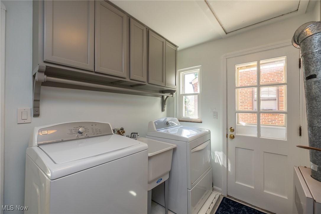 21475 Eaton Road Cleveland, OH 44126 - Photo 29 of 31 Washroom featuring cabinets and washer and clothes dryer