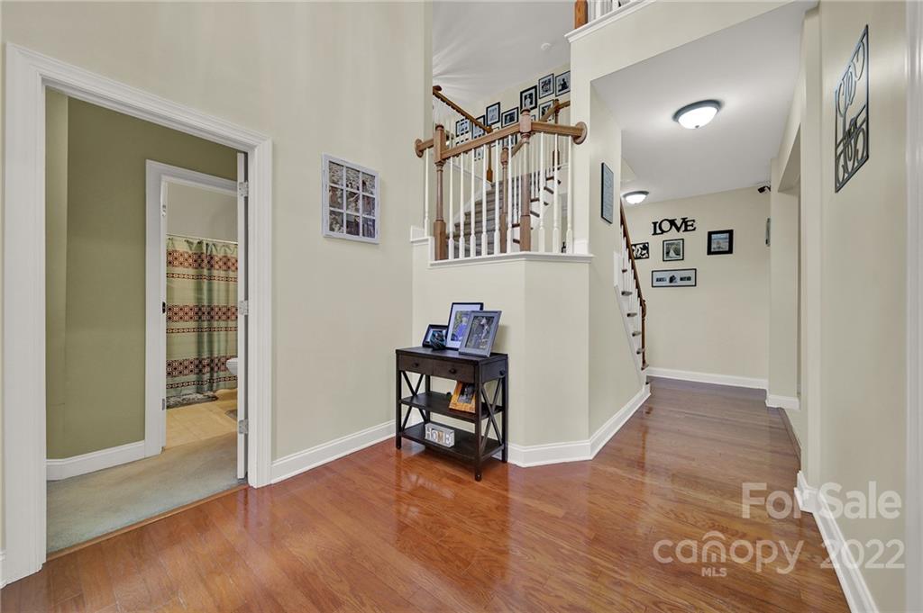 2420 Blueberry Ridge Road Matthews, NC 28105 - Photo 3 of 48 a view of a livingroom with furniture and wooden floor
