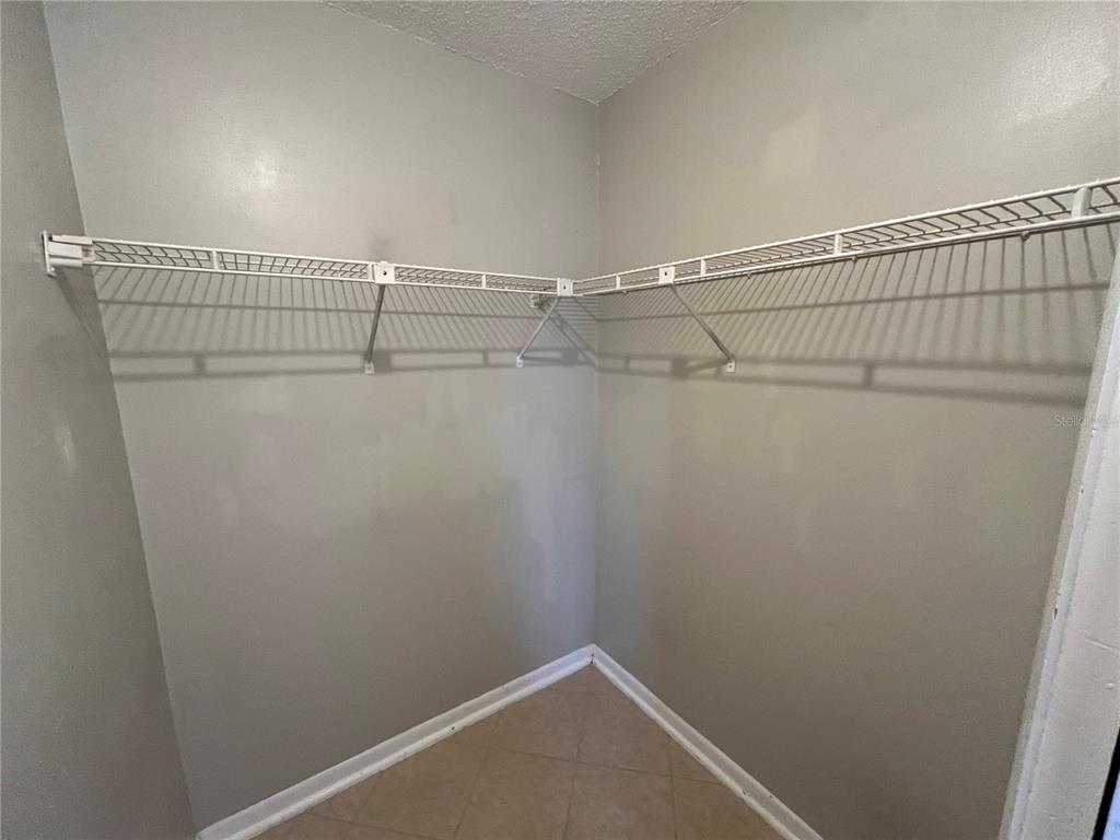 1239 East Ridgewood Street Orlando, FL 32803 - Photo 11 of 15 a view of a room with racks on the wall