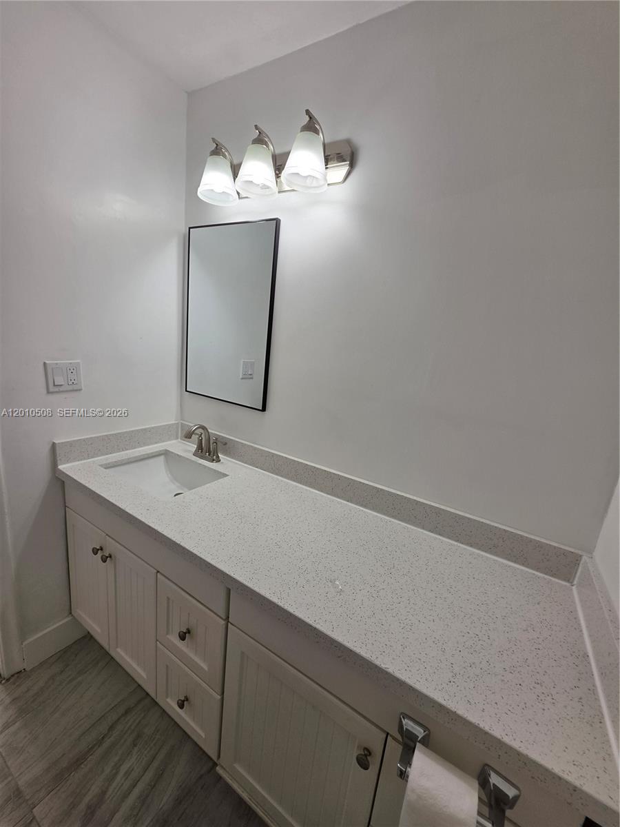 14775 Southwest 83rd Lane, Unit 14775 Miami, FL 33193 - Photo 10 of 26 hallway bathroom