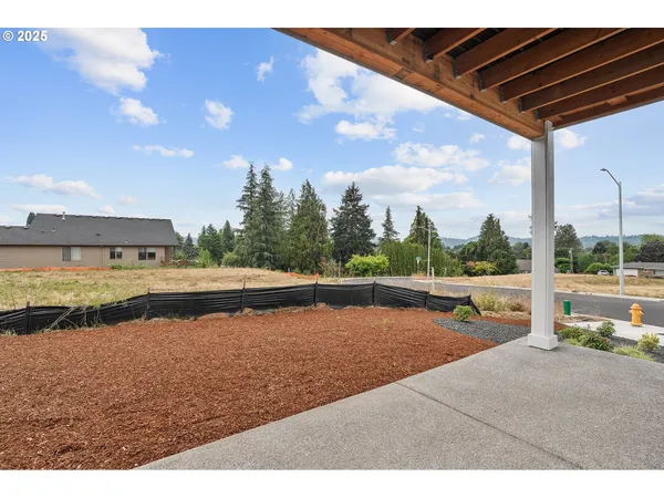 a view of a swimming pool with a yard