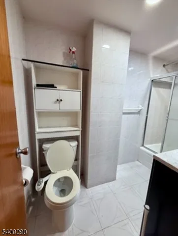 a bathroom with a toilet and a sink