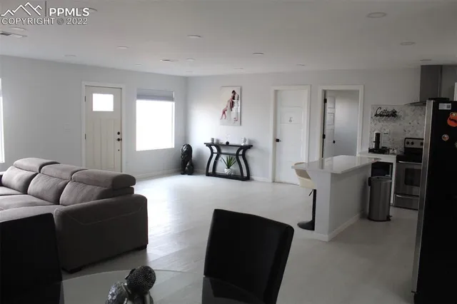 a living room with furniture and a couch