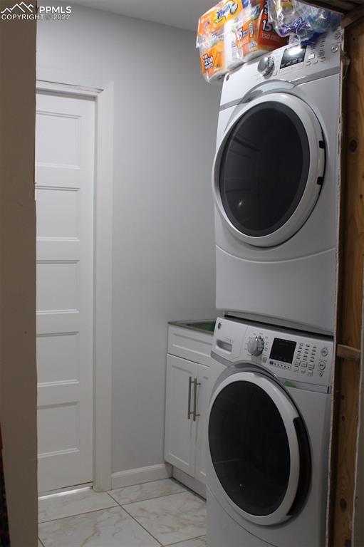 425 Weissenfluh Road Yoder, CO 80864 - Photo 23 of 24 a utility room with dryer and washer