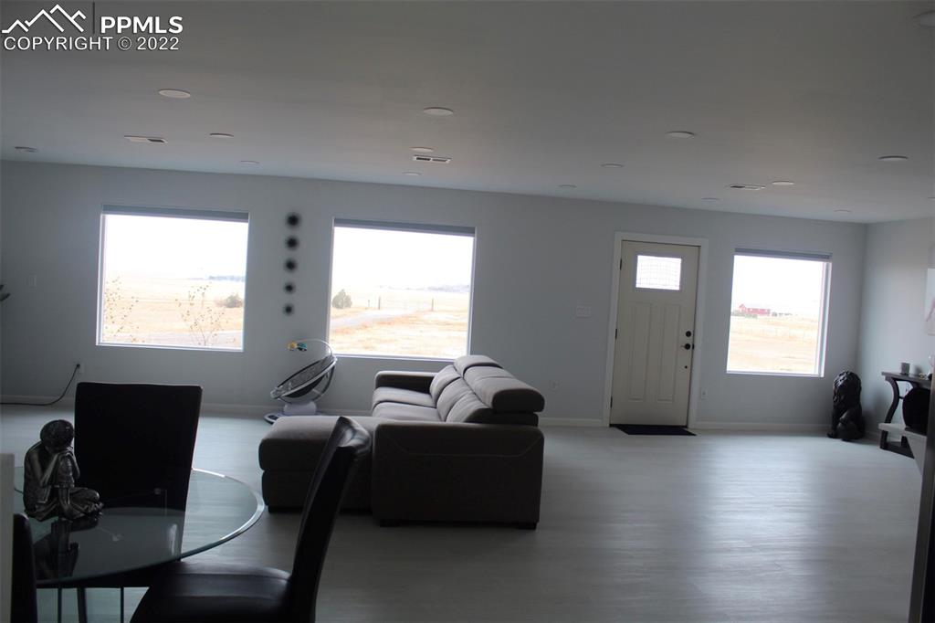 425 Weissenfluh Road Yoder, CO 80864 - Photo 6 of 24 a living room with furniture and a window