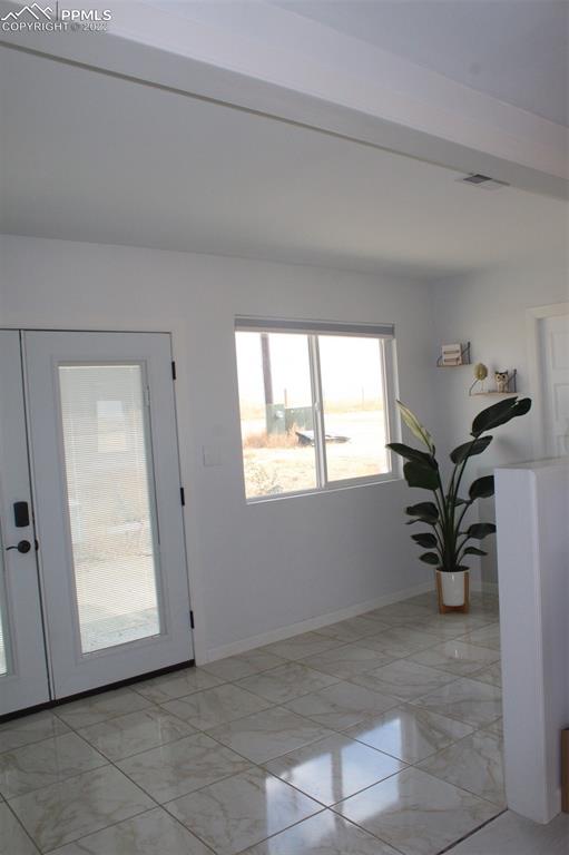 425 Weissenfluh Road Yoder, CO 80864 - Photo 8 of 24 a view of an empty room and a window