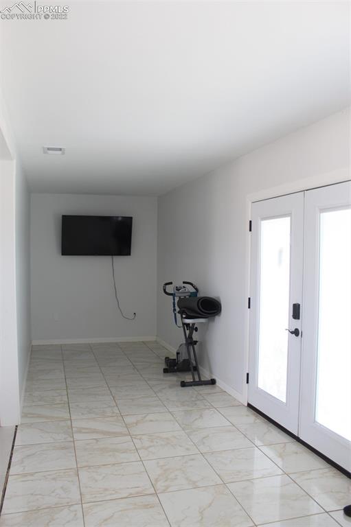 425 Weissenfluh Road Yoder, CO 80864 - Photo 9 of 24 a view of room with a flat screen tv