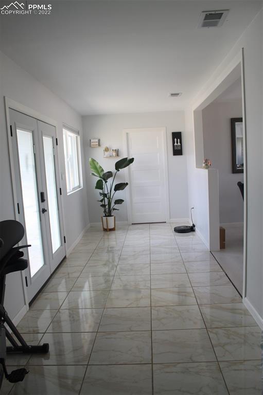 425 Weissenfluh Road Yoder, CO 80864 - Photo 10 of 24 a view of an empty room with a window