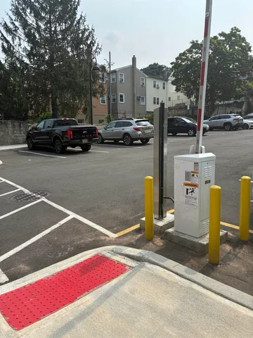 a view of street with parked cars