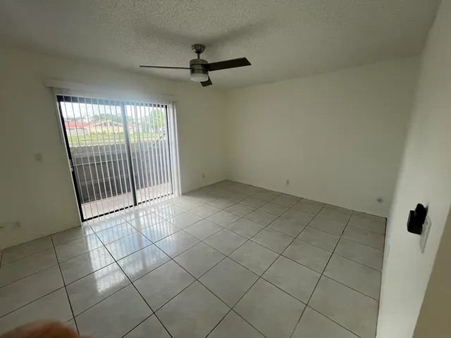 a view of a livingroom with a staircase