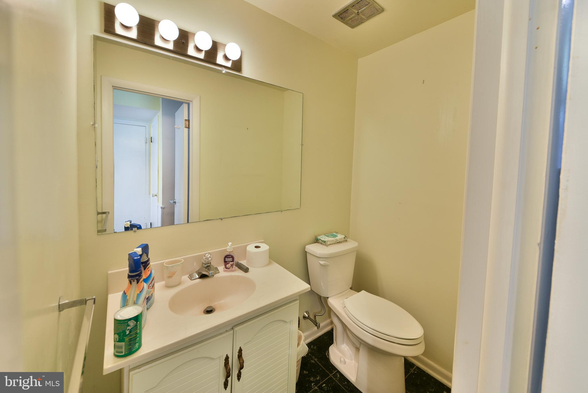 1930 Valley Road Jenkintown, PA 19046 - Photo 15 of 30 a bathroom with a sink mirror and toilet