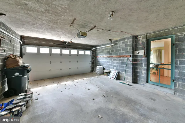 a view of a house with a yard and tree s