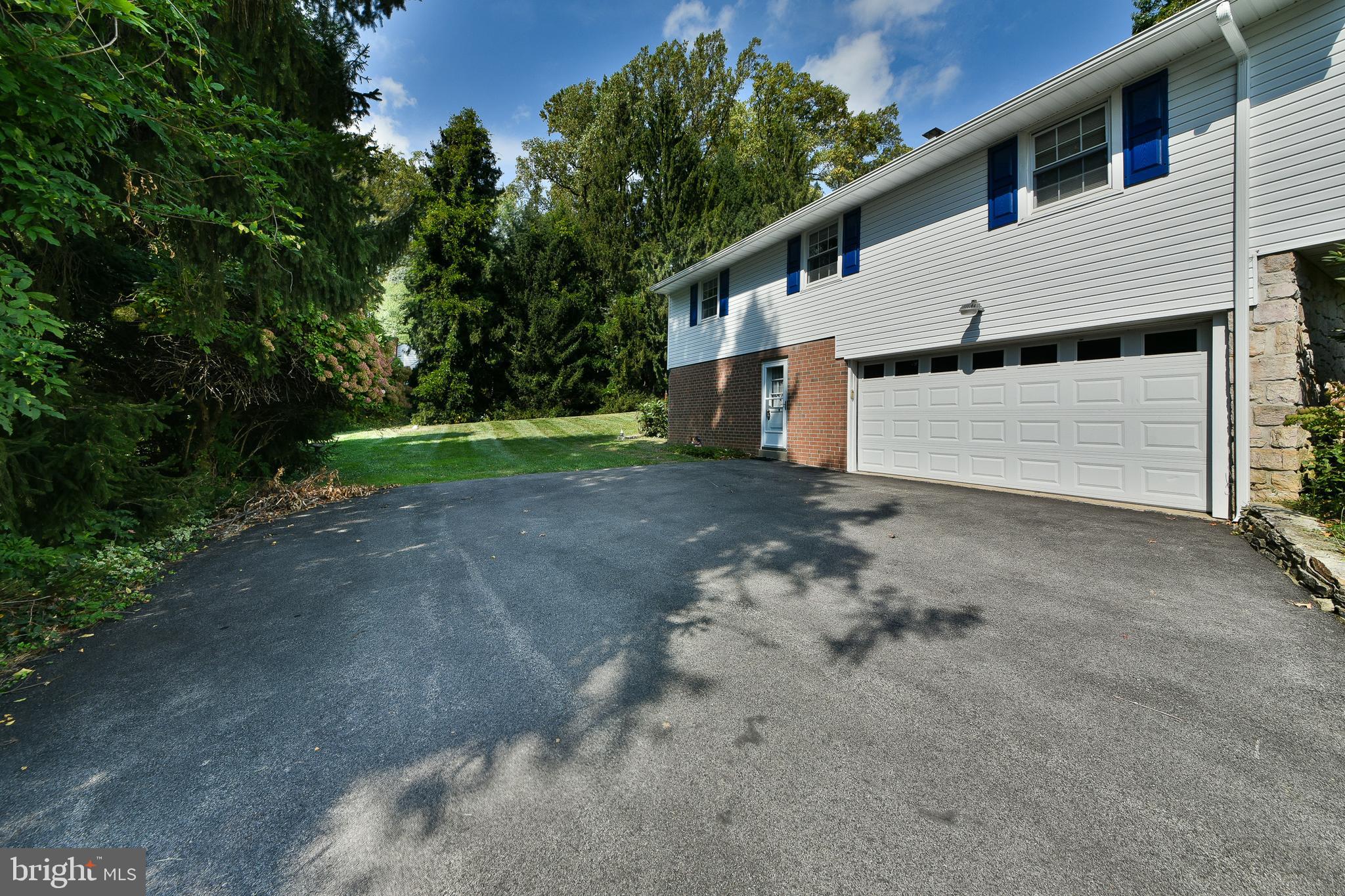 1930 Valley Road Jenkintown, PA 19046 - Photo 20 of 30 a view of a house with backyard and trees